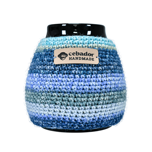 Handgjord kalebassvärmare Dolores på en kalebass