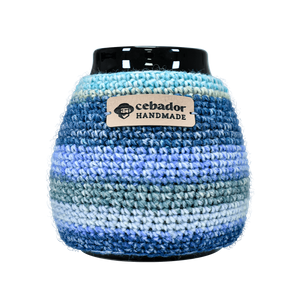 Handgjord kalebassvärmare Dolores på en kalebass