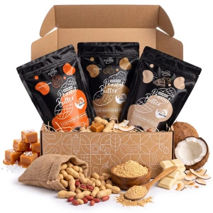 Presentset med jordnötssmör i pulverform Nustino: Classic + Salted Caramel + White Chocolate & Coconut 3x400g